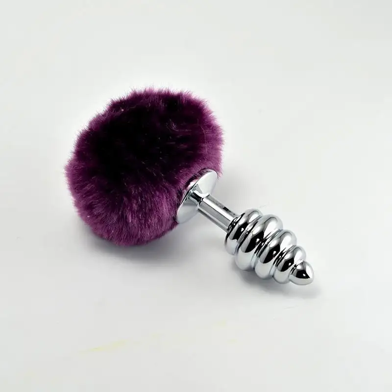 Plug-Anal-en-metal-en-spirale-avec-Pompon-mauve-1